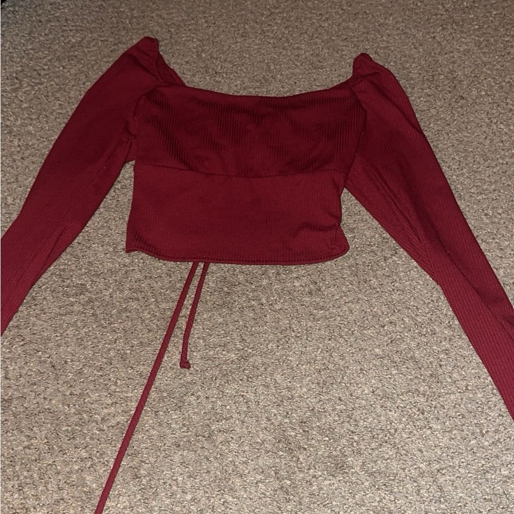 Brand new shirt bought over a year ago never wore because the back is open!
